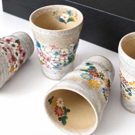 Japanese seasonal flower ceramic tea cup set with five floral cups, made in Japan