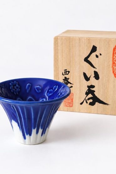 Blue Mount Fuji porcelain sake cup with cherry blossom details inside, presented with a paulownia wooden gift box.. Available at j-okini Malta