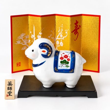 White porcelain sheep figurine inspired by the Japanese zodiac. White porcelain sheep figurine inspired by the Japanese zodiac.